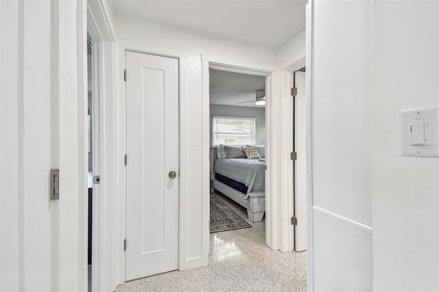 corridor with speckled floor