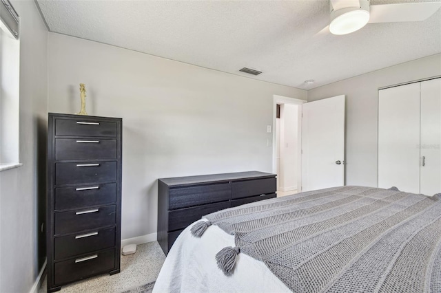 bedroom featuring baseboards, a closet, and a ceiling fan