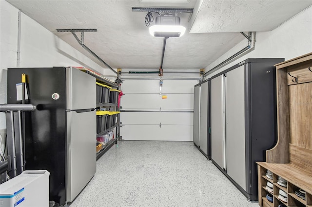 garage featuring freestanding refrigerator