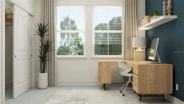 office area with baseboards and a healthy amount of sunlight