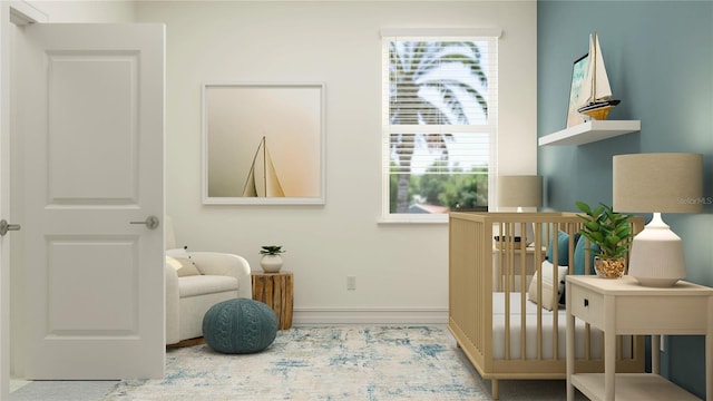 bedroom featuring baseboards