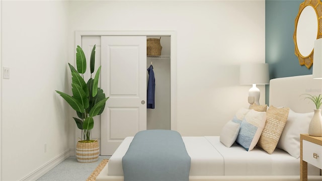 bedroom featuring a closet and baseboards