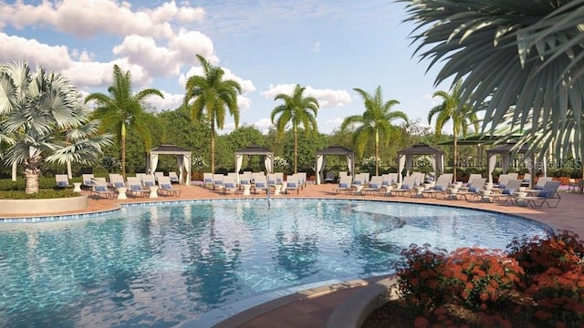 community pool with a patio area and a gazebo