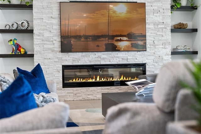 5500 W Lake Butler Rd, Windermere, FL 34786 - living room with a stone fireplace and tile patterned floors
