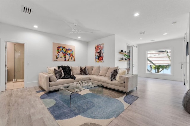 5500 W Lake Butler Rd, Windermere, FL 34786 - living room with light wood finished floors, recessed lighting, baseboards, and a ceiling fan