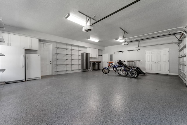 5500 W Lake Butler Rd, Windermere, FL 34786 - garage with freestanding refrigerator and a garage door opener