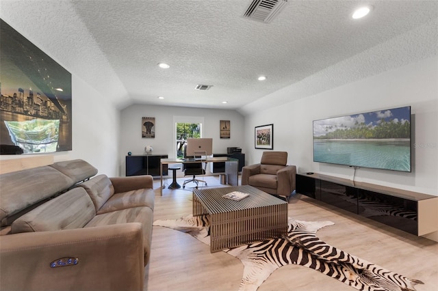 5500 W Lake Butler Rd, Windermere, FL 34786 - living area featuring light wood-type flooring, a desk, a textured ceiling, and recessed lighting