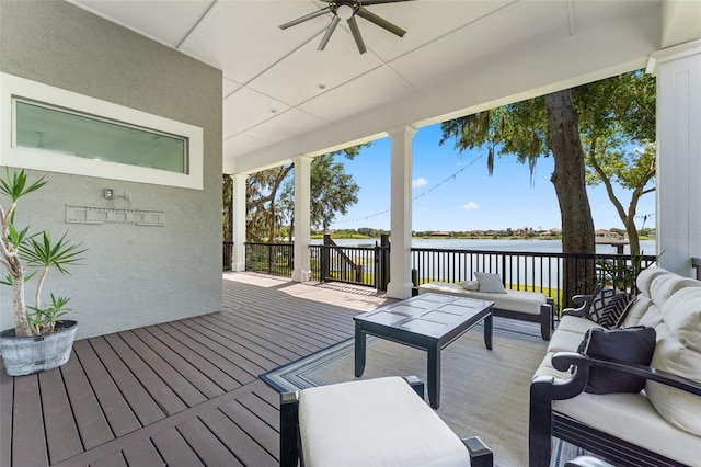 5500 W Lake Butler Rd, Windermere, FL 34786 - wooden terrace featuring an outdoor living space, a water view, and a ceiling fan