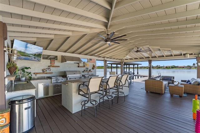 5500 W Lake Butler Rd, Windermere, FL 34786 - wooden terrace with area for grilling, a water view, and ceiling fan