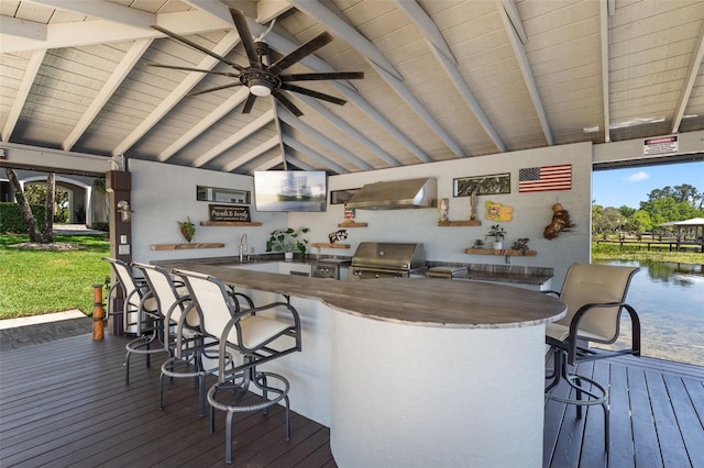 5500 W Lake Butler Rd, Windermere, FL 34786 - deck featuring grilling area, an outdoor kitchen, and a ceiling fan