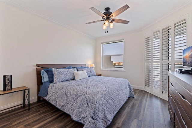 bedroom featuring dark wood-style floors, ornamental molding, baseboards, and a ceiling fan