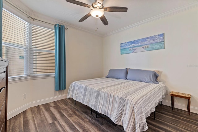 bedroom featuring wood finished floors, crown molding, baseboards, and ceiling fan