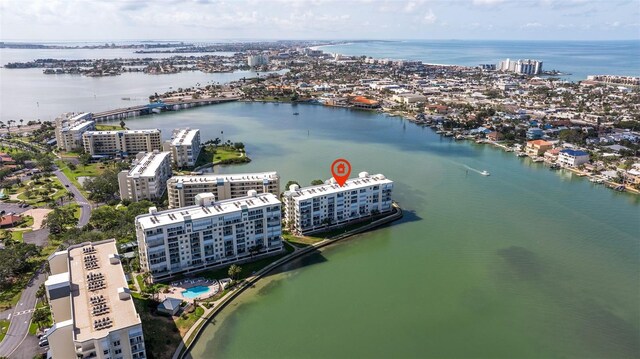 view of urban area with a nearby body of water and apartment complex