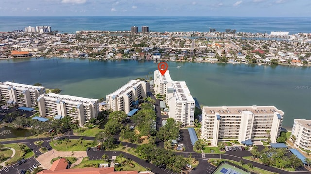 view of urban area featuring a nearby body of water and apartment complex