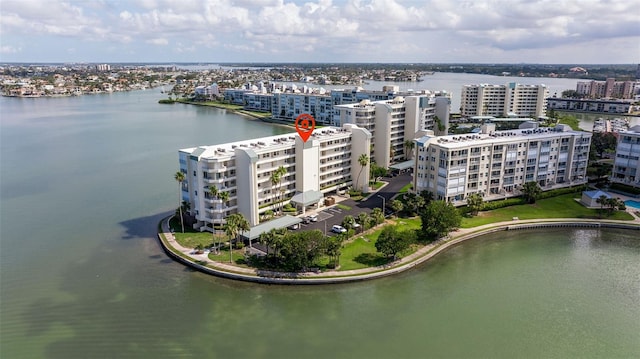 bird's eye view of apartment complex / building and a nearby body of water