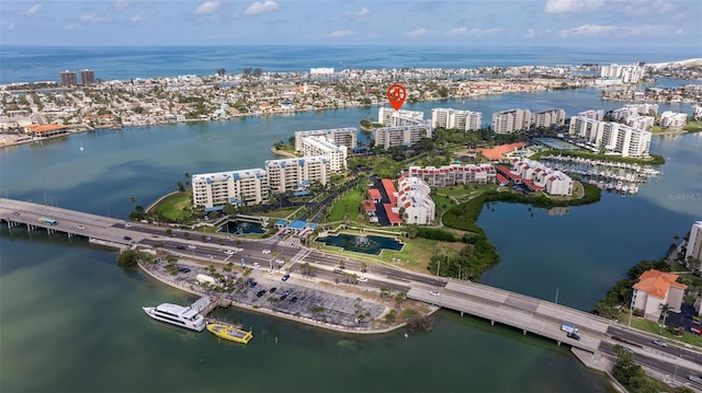 view of property location featuring a large body of water and a notable bridge