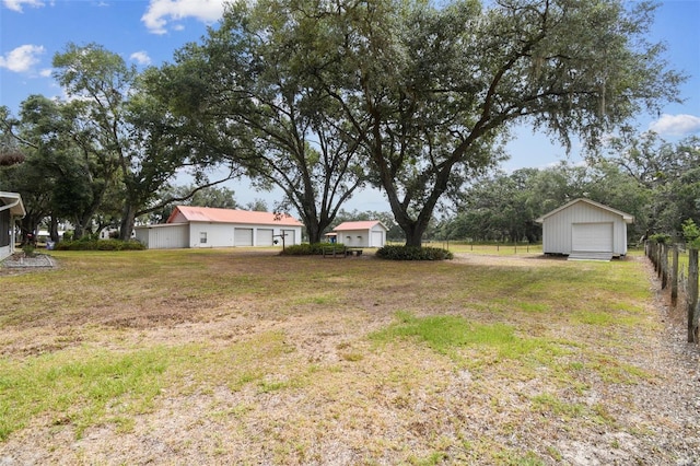 1202 Williams Rd, Plant City, FL 33565 - view of yard with a garage and an outdoor structure