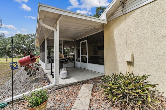 1202 Williams Rd, Plant City, FL 33565 - view of patio with a sunroom