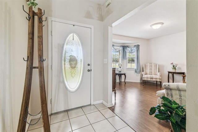 1202 Williams Rd, Plant City, FL 33565 - foyer entrance with light wood-style floors and baseboards