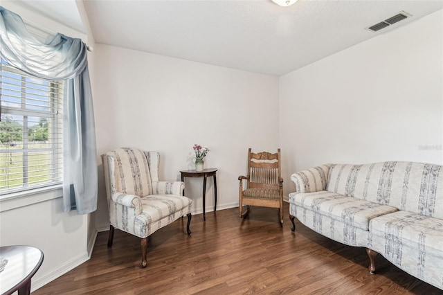 1202 Williams Rd, Plant City, FL 33565 - living area featuring wood finished floors and baseboards