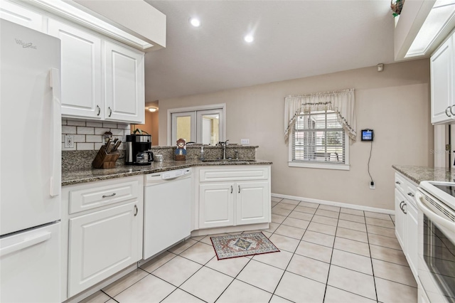 1202 Williams Rd, Plant City, FL 33565 - kitchen featuring white appliances, a sink, white cabinets, tasteful backsplash, and light tile patterned flooring