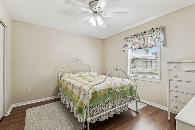 1202 Williams Rd, Plant City, FL 33565 - bedroom featuring dark wood finished floors, baseboards, and ceiling fan