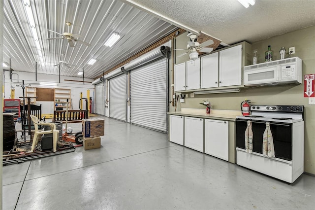1202 Williams Rd, Plant City, FL 33565 - garage featuring ceiling fan