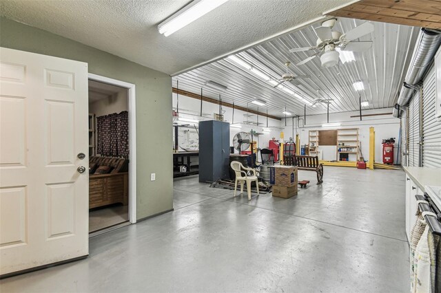 1202 Williams Rd, Plant City, FL 33565 - garage featuring a ceiling fan