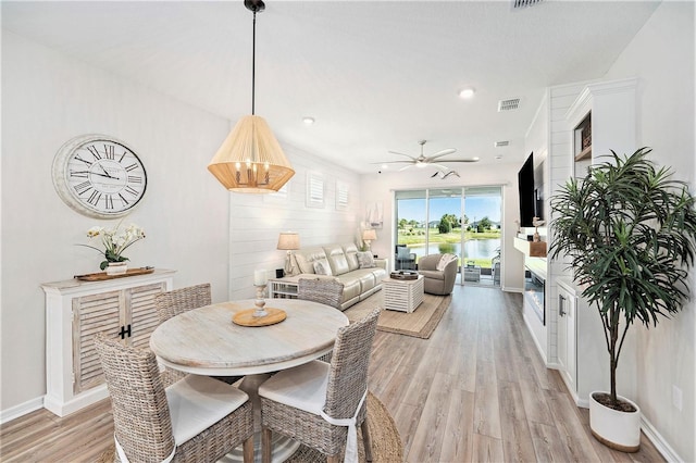 10418 Spring Tide Way, Parrish, FL 34219 - dining room with light wood-style floors, ceiling fan, baseboards, and recessed lighting