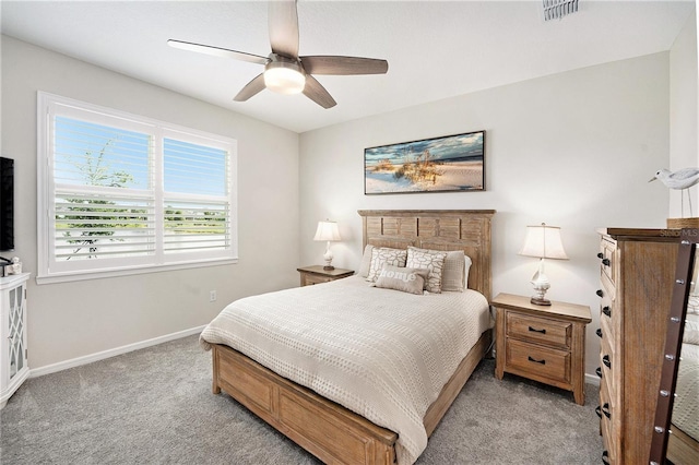 10418 Spring Tide Way, Parrish, FL 34219 - bedroom featuring light colored carpet, baseboards, and ceiling fan