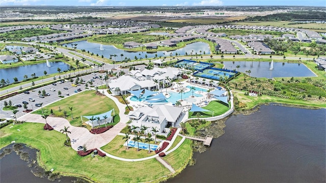 10418 Spring Tide Way, Parrish, FL 34219 - aerial perspective of suburban area featuring a nearby body of water and a pool