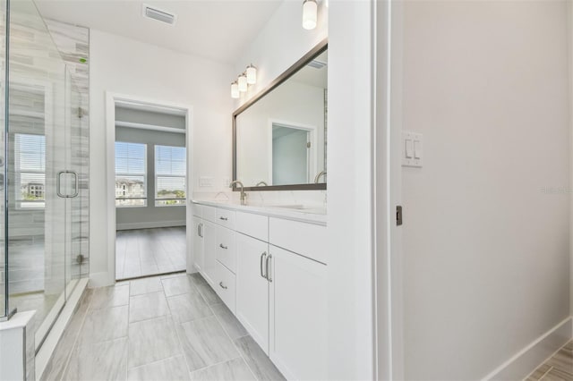 7232 Sutton Ln, Sarasota, FL 34240 - full bath featuring vanity, a shower stall, and baseboards