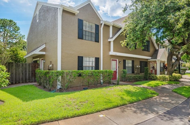 16504 Lake Brigadoon Cir, Tampa, FL 33618 - view of property featuring stucco siding