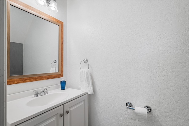 16504 Lake Brigadoon Cir, Tampa, FL 33618 - bathroom with vanity and a textured wall