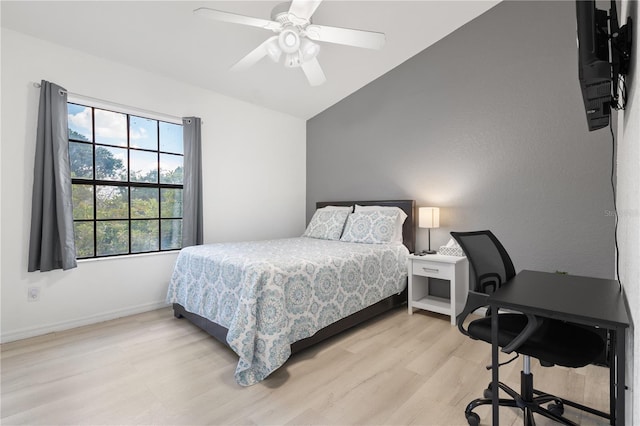 16504 Lake Brigadoon Cir, Tampa, FL 33618 - bedroom featuring light wood-type flooring, lofted ceiling, baseboards, and ceiling fan