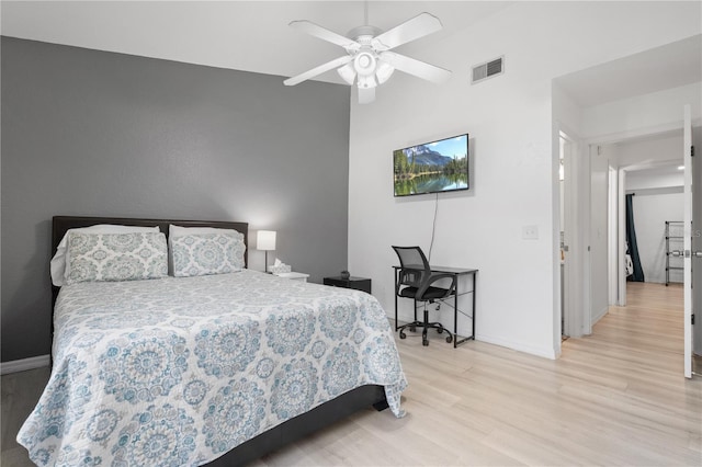 16504 Lake Brigadoon Cir, Tampa, FL 33618 - bedroom featuring wood finished floors, baseboards, a ceiling fan, and a towering ceiling
