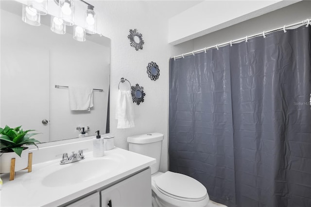 16504 Lake Brigadoon Cir, Tampa, FL 33618 - full bath with toilet, vanity, and a shower with curtain