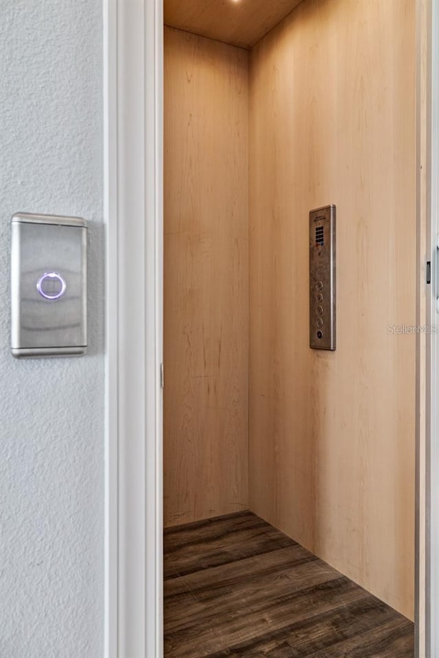 clothes washing area featuring elevator