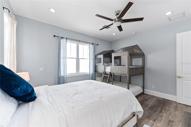 bedroom featuring wood finished floors, baseboards, recessed lighting, and ceiling fan