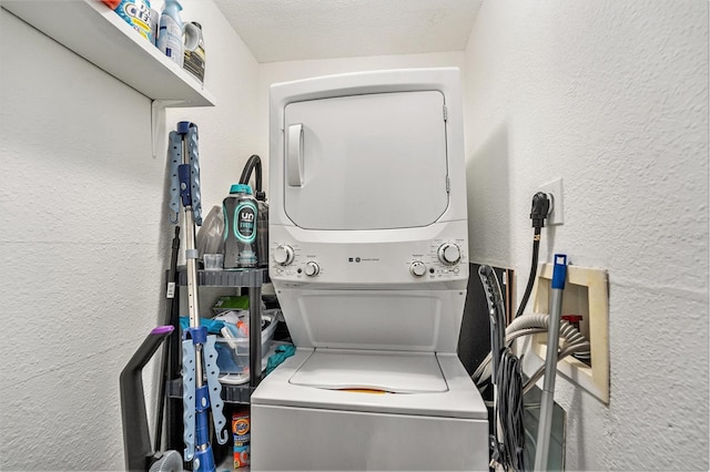 200 Country Club Dr Unit 403, Largo, FL 33771 - laundry room with stacked washer and clothes dryer and a textured wall
