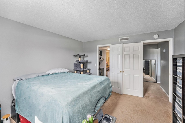 200 Country Club Dr Unit 403, Largo, FL 33771 - bedroom with light carpet and a textured ceiling