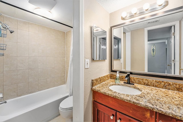 200 Country Club Dr Unit 403, Largo, FL 33771 - full bathroom with toilet, shower / tub combo with curtain, vanity, a textured wall, and a textured ceiling
