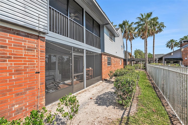 200 Country Club Dr Unit 403, Largo, FL 33771 - view of yard with a sunroom and fence