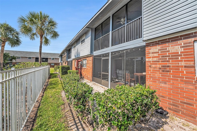 200 Country Club Dr Unit 403, Largo, FL 33771 - view of yard featuring a sunroom and fence