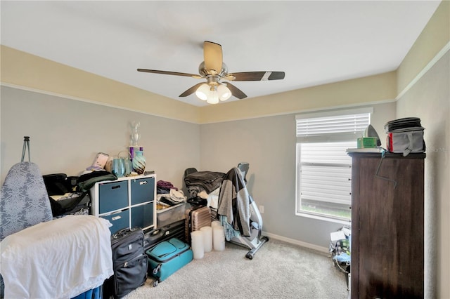 305 St Georges Cir, Eagle Lake, FL 33839 - bedroom featuring carpet, baseboards, and a ceiling fan