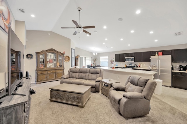 305 St Georges Cir, Eagle Lake, FL 33839 - living room with vaulted ceiling, ceiling fan, light carpet, and recessed lighting