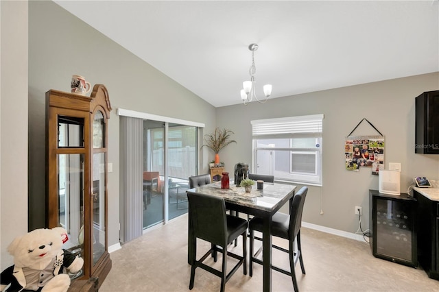 305 St Georges Cir, Eagle Lake, FL 33839 - dining area featuring a chandelier, vaulted ceiling, plenty of natural light, and baseboards