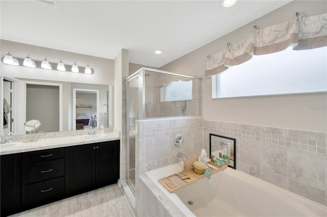 305 St Georges Cir, Eagle Lake, FL 33839 - full bathroom with a stall shower, a bath, double vanity, and recessed lighting