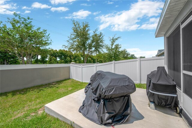 305 St Georges Cir, Eagle Lake, FL 33839 - view of patio / terrace with grilling area