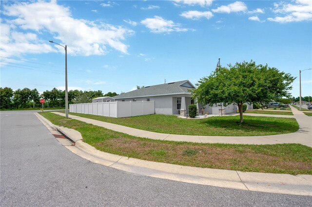 305 St Georges Cir, Eagle Lake, FL 33839 - view of front of house with stucco siding